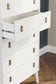 Aprilyn Queen Bookcase Bed with Dresser and Chest